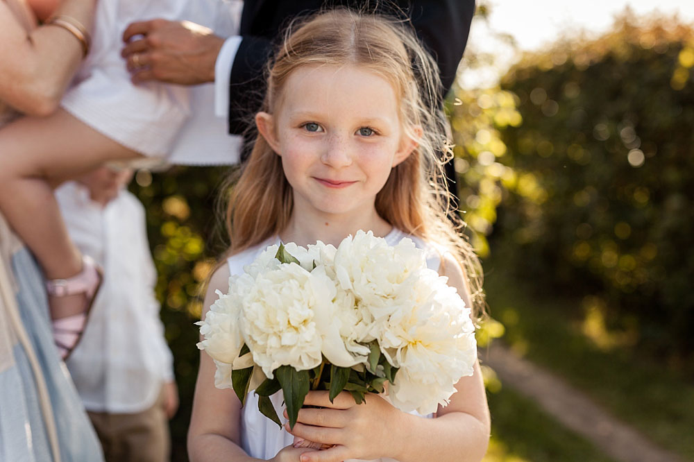 flower girl holding flowers