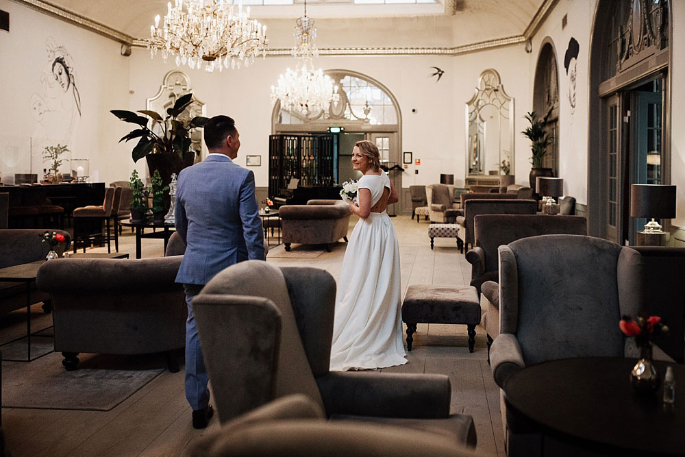 bride and groom getting ready at Nimb Hotel in Copenhagen