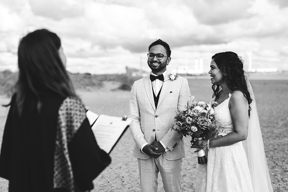 registrar performing a civil wedding at Amager strand in Copenhagen