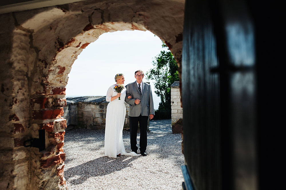 bride and father of the bride moments before the wedding in Stevns Klint