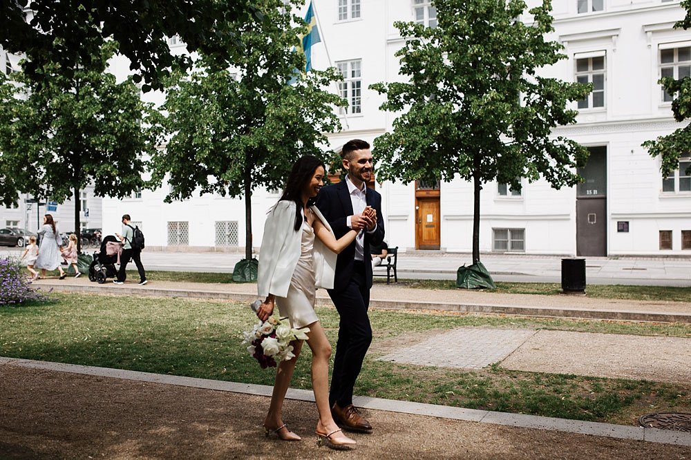 bride and groom exploring Copenhagen 