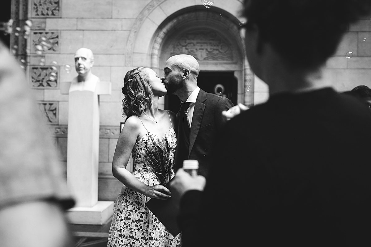 bride and groom at Copenhagen City Hall. Natural wedding photos by Natalia Cury photographer