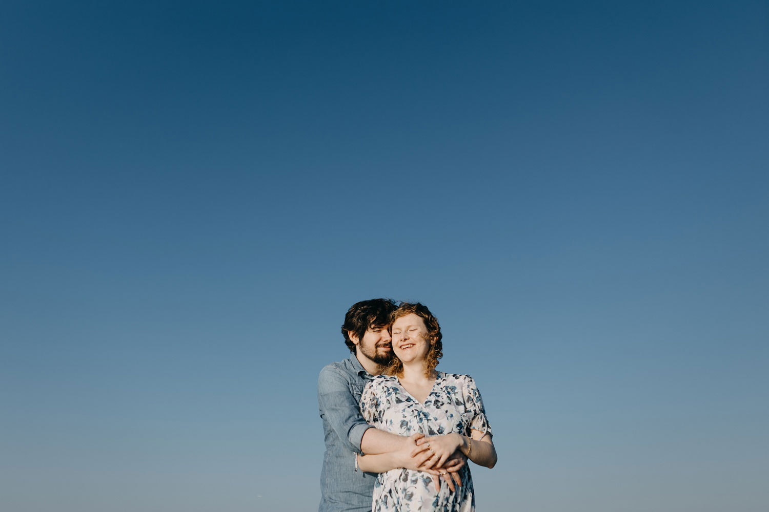 Copenhagen beach maternity photography capturing the joy of motherhood