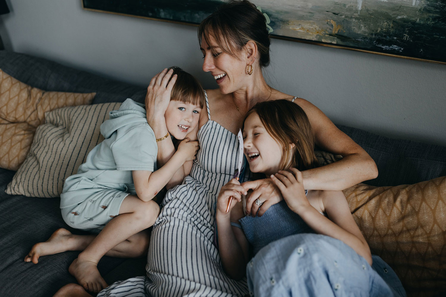 Happy family during a lifestyle family photo session at home in Copenhagen