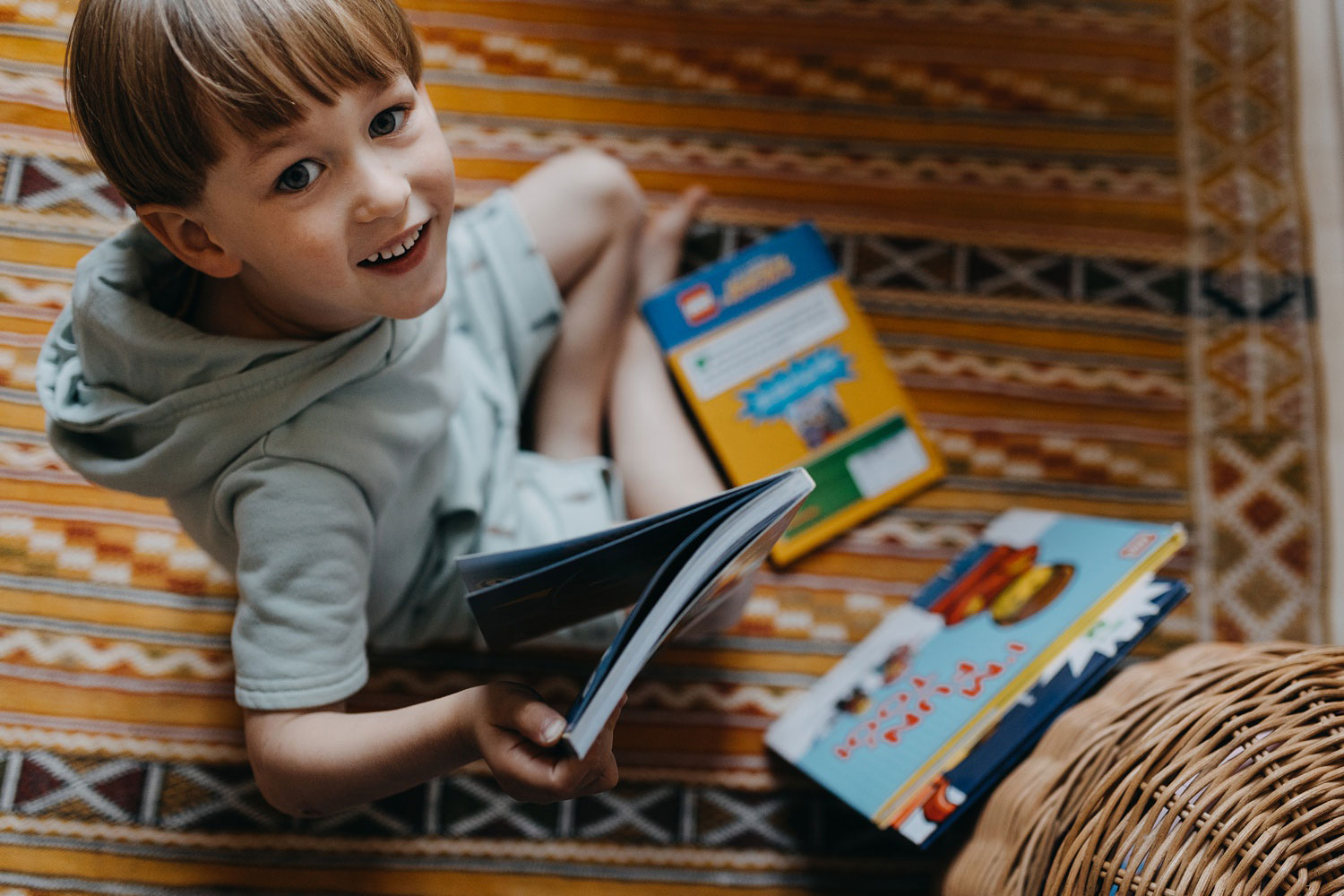 toddler reading books at home in Copenhagen
