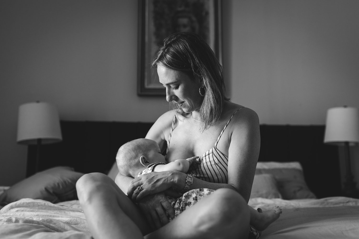 Copenhagen-based baby photographer captures precious moments of a baby being breastfed 