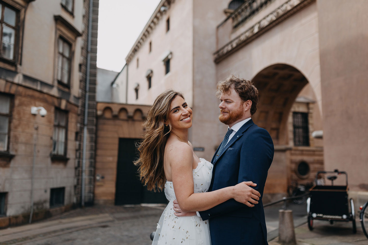 Bride and Groom Embrace - Copenhagen Wedding Photo