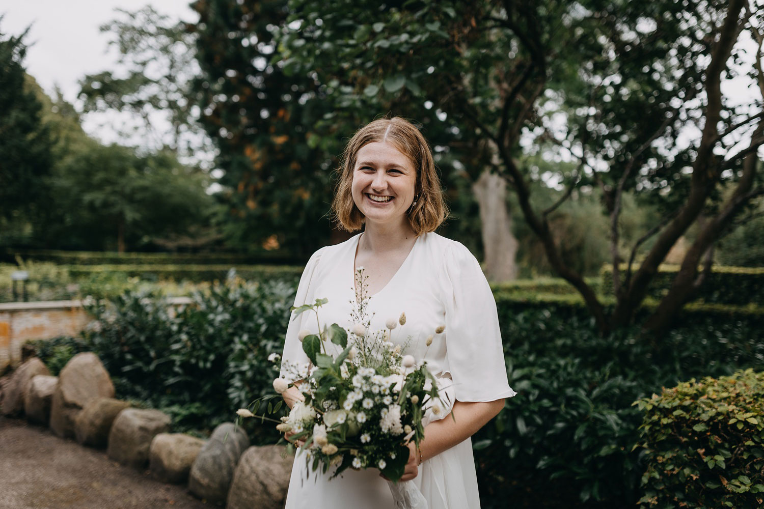 bride smiling at her husband in Copenhagen