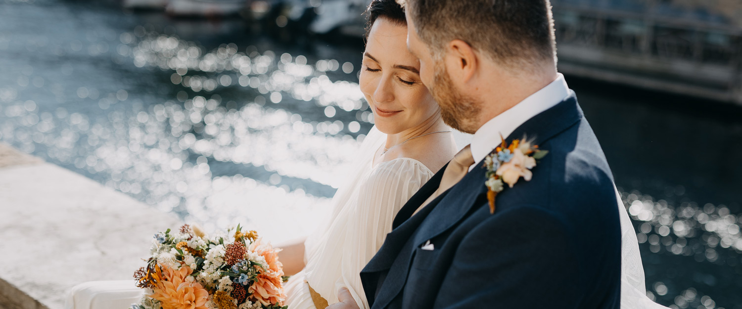 bride and groom posing for wedding photographer in Copenhagen