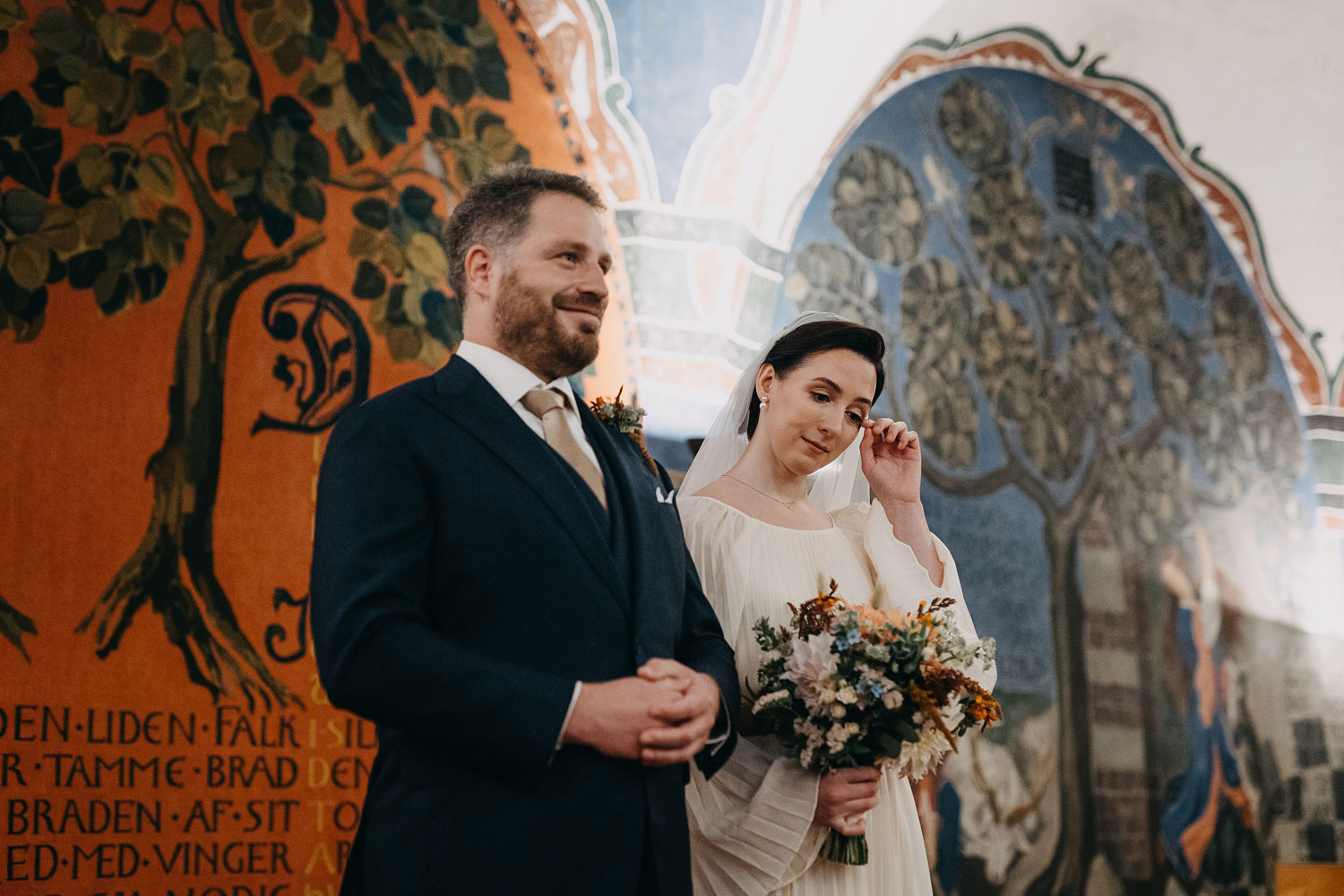 bride getting emotional during civil wedding ceremony at Copenhagen city hall