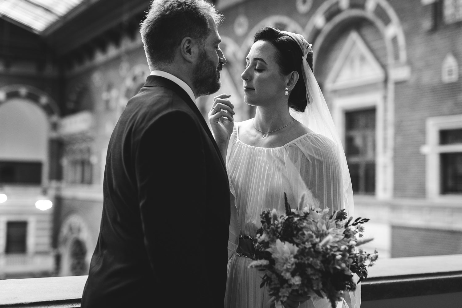 intimate moment between bride and groom after their civil wedding ceremony at Copenhagen city hall