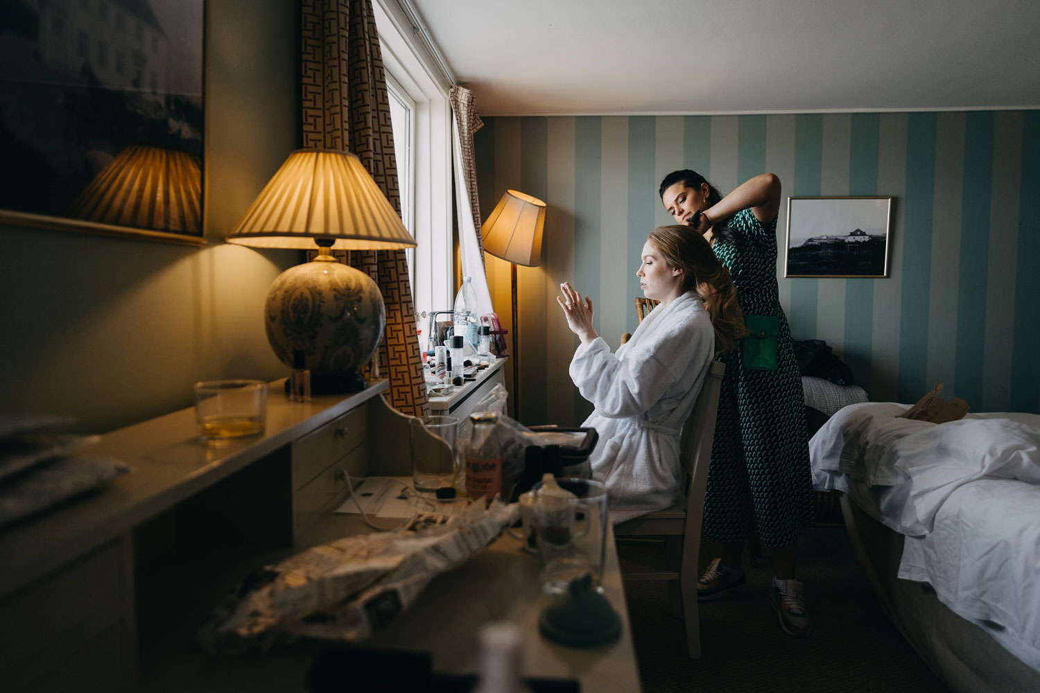 shot of a bride and make up artist  at Helenekilde Badehotel in Tisvildeleje