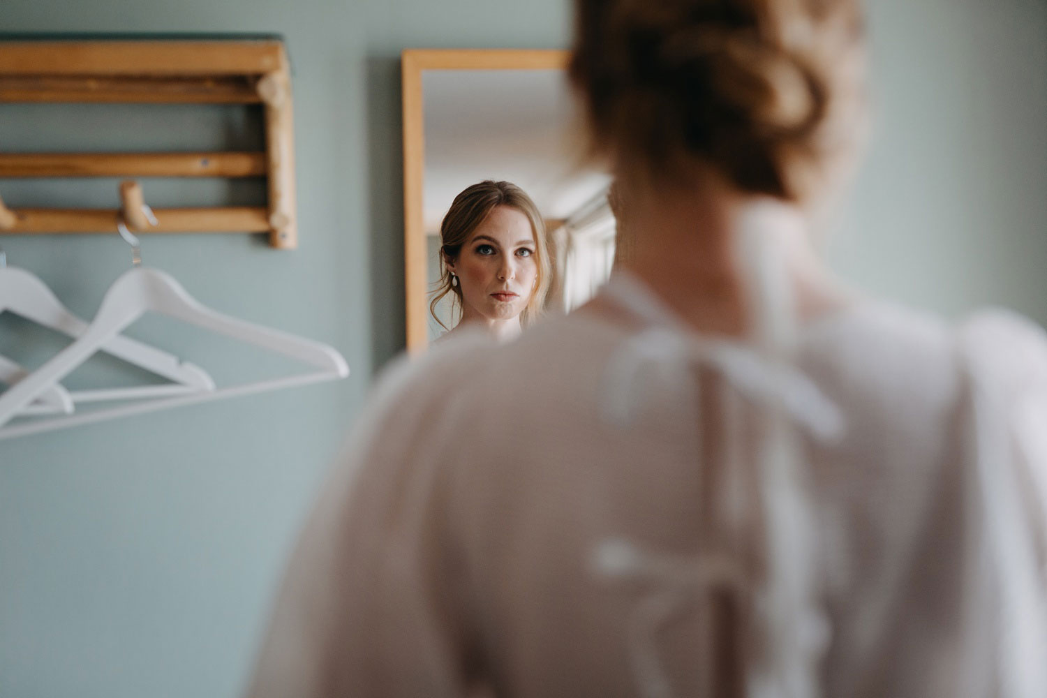 Bride's quiet reflection before the ceremony at Helenekilde Badehotel in Tisvildeleje