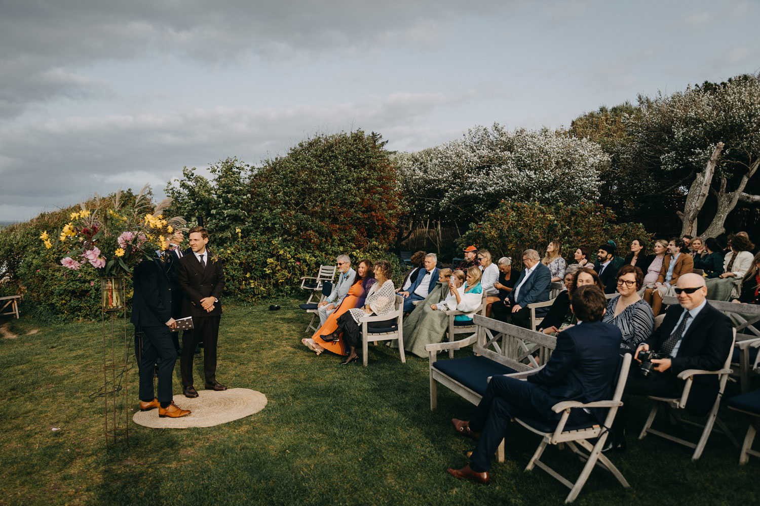 groom waiting for the bride to walk down the aisle