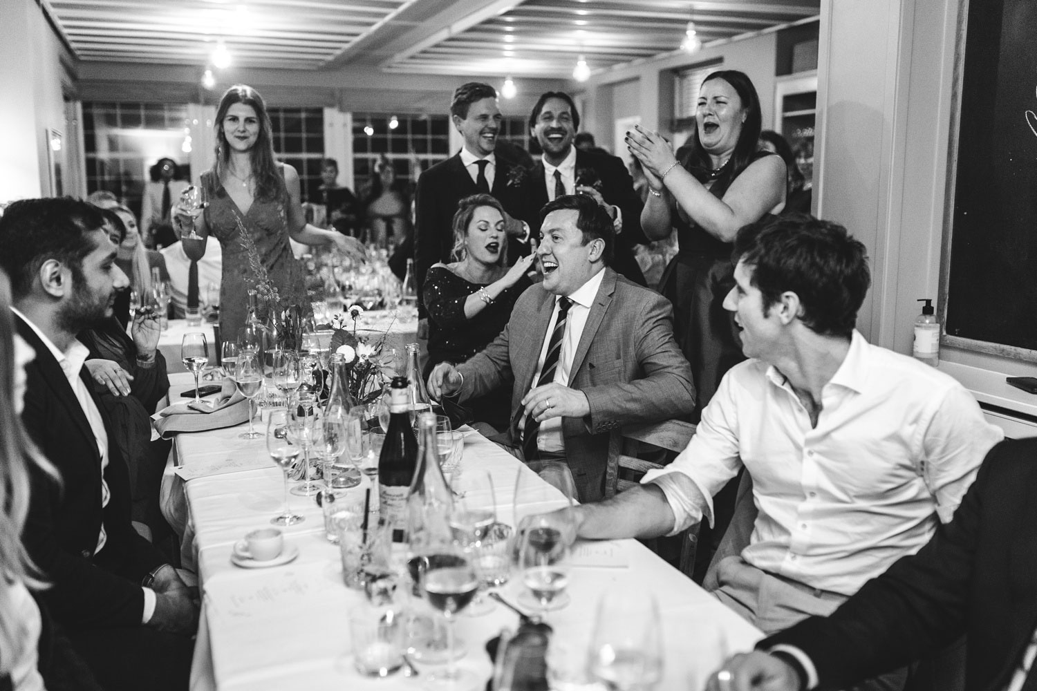 Warm moments as guests share laughter and joy during the heartfelt reception at Helenekilde Badehotel in Tisvildeleje