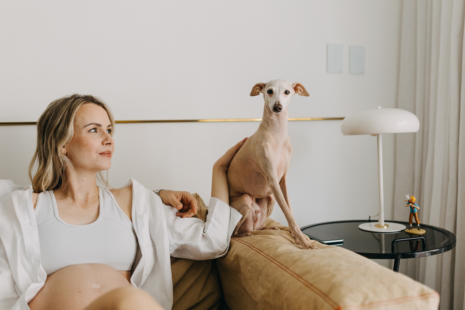 Capturing the love and anticipation of parenthood with two playful Italian Greyhounds.