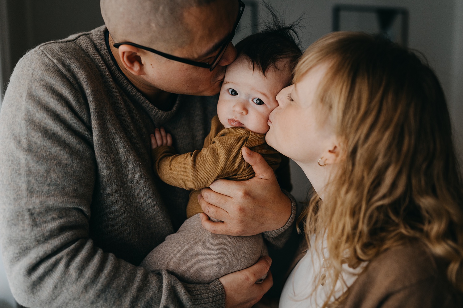 Copenhagen family portrait with natural light and indoor warmth