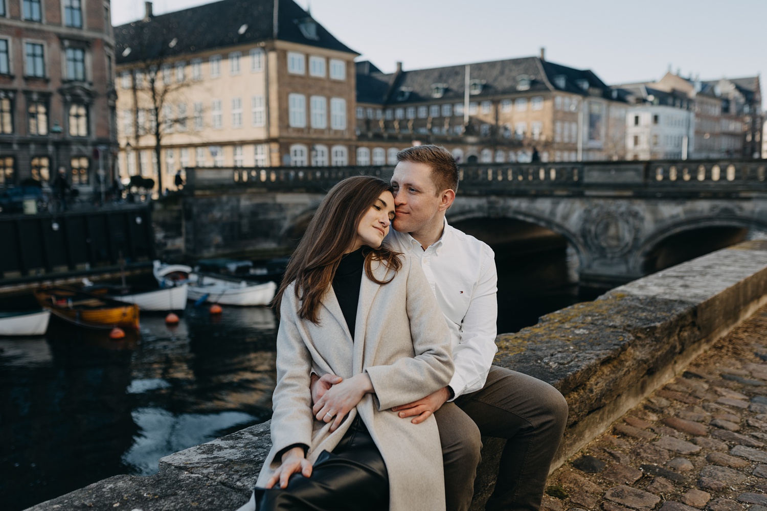 Romantic engagement session along Frederiksholms Kanal in Copenhagen