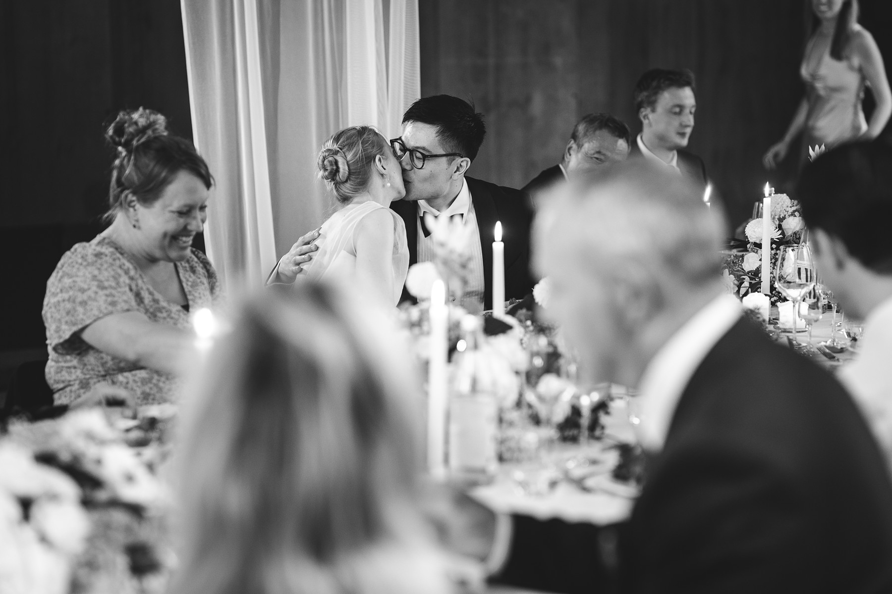 Couple sharing a moment during their reception at Mogens Dahl Koncertsal
